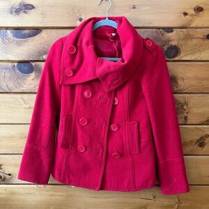 Bright red double breasted peacoat.